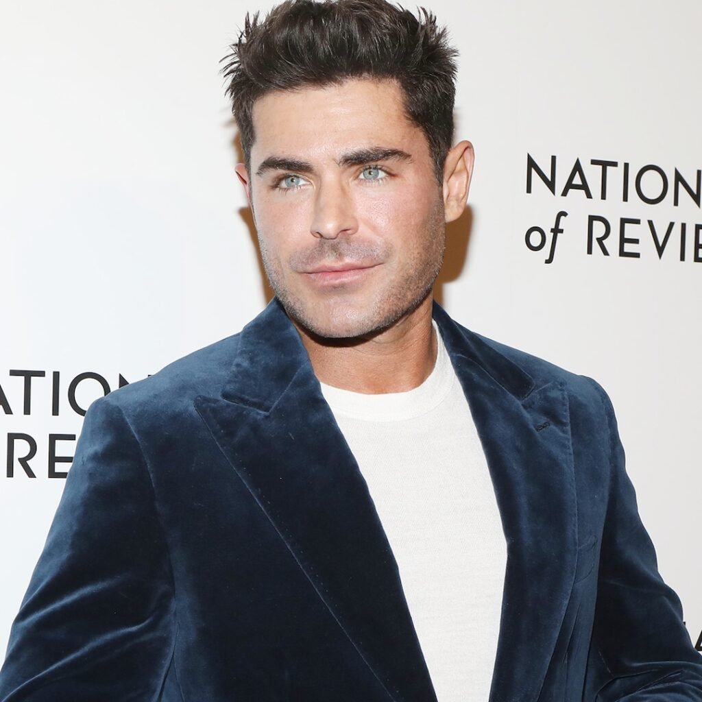 Zac Efron Debuts Bleach Blonde Hair During Nina Dobrev Vacation