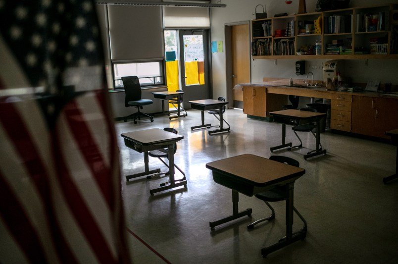 STAMFORD, CONNECTICUT - OCTOBER 21: A kindergarten room sits empty at Rogers International School as students from that class quarantine at home, according to parents, on October 21, 2020 in Stamford, Connecticut. Stamford Public Schools announced the previous week that a member of the school community had tested positive for COVID-19, although few details were given to the school at large. The school district is continuing the fall semester with a hybrid model, with in-class learning every other day and distance learning at home. (Photo by John Moore/Getty Images)